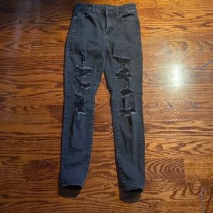 black jeans with holes